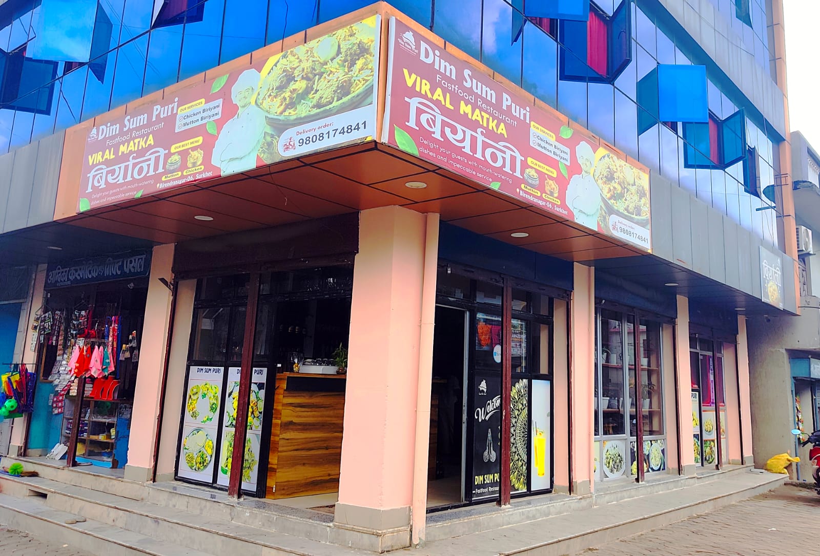 Dim Sum Puri storefront with Viral Matka Biryani signage